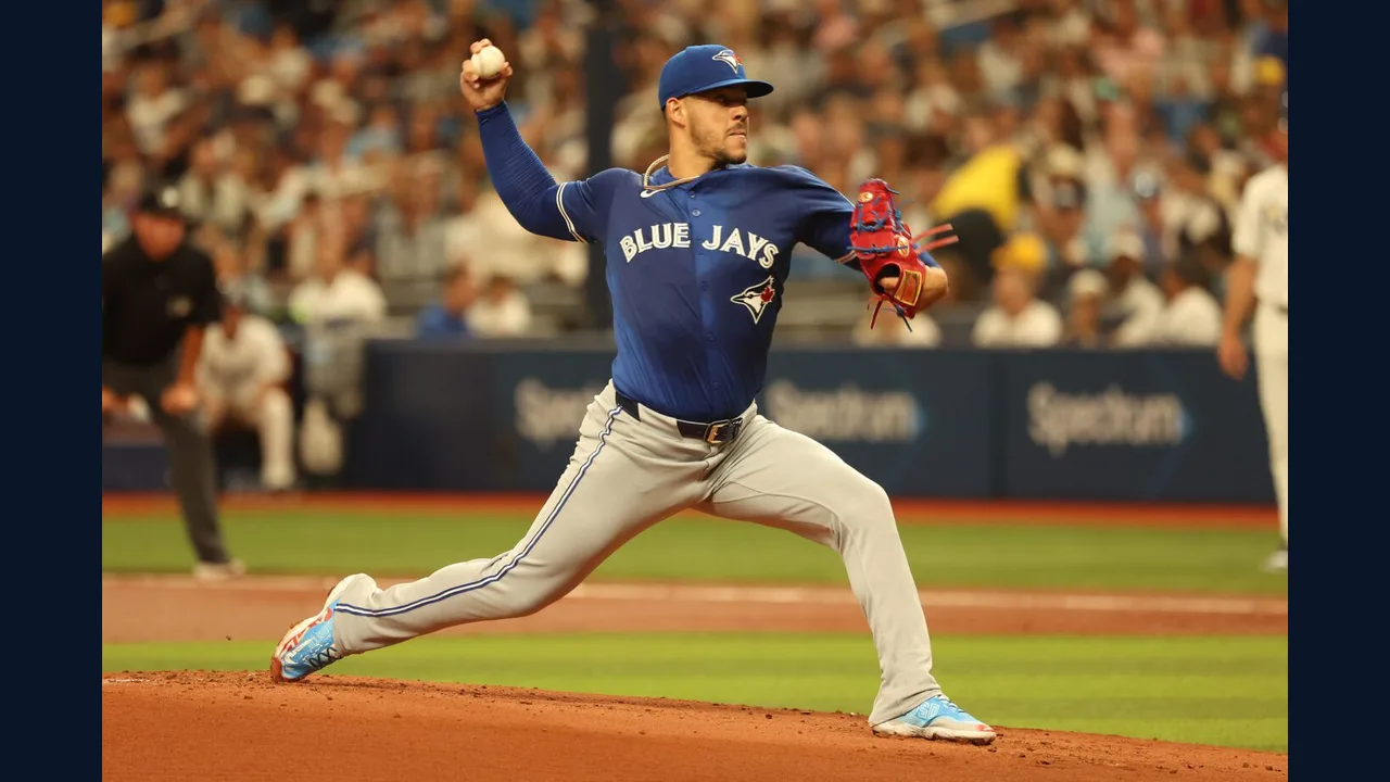 Baseball pitcher mid throw in a stadium